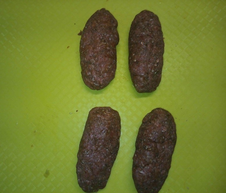 hamburger rolled up with all ingredients inside.